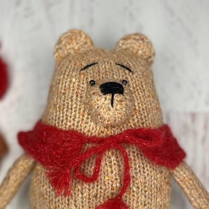 Knitted Teddy Bear – Handmade Plush Toy – Beige Speckled Yarn Bear with Red Scarf – Soft Stuffed Animal – Gift for Baby – Nursery Decor