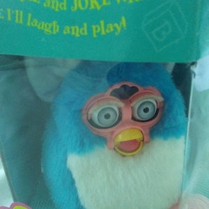 Furby Babies 1999 Baby Blue with white belly, Pink Hair, Face And Feet. Grey Eyes - RARE New In Box