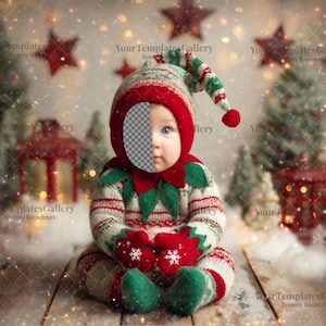 May include: A baby dressed in a festive elf costume, featuring a red and green hat with a pom-pom, a matching sweater, and mittens. The background includes Christmas trees, red star decorations, and a wooden floor, creating a holiday scene.