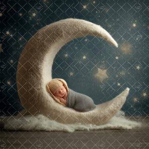 May include: A newborn baby swaddled in a gray blanket and wearing a knit cap, resting on a plush, cream-colored crescent moon prop. The background features a starry night sky with a grid pattern and soft lighting.