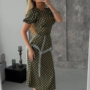 olive green peplum dress Antonio Melani Olive Green Polyester Viscose Blend Military Peplum Sheath Dress