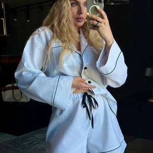 Conjunto de dos piezas de lino blanco: camisa holgada y pantalones cortos de cintura alta