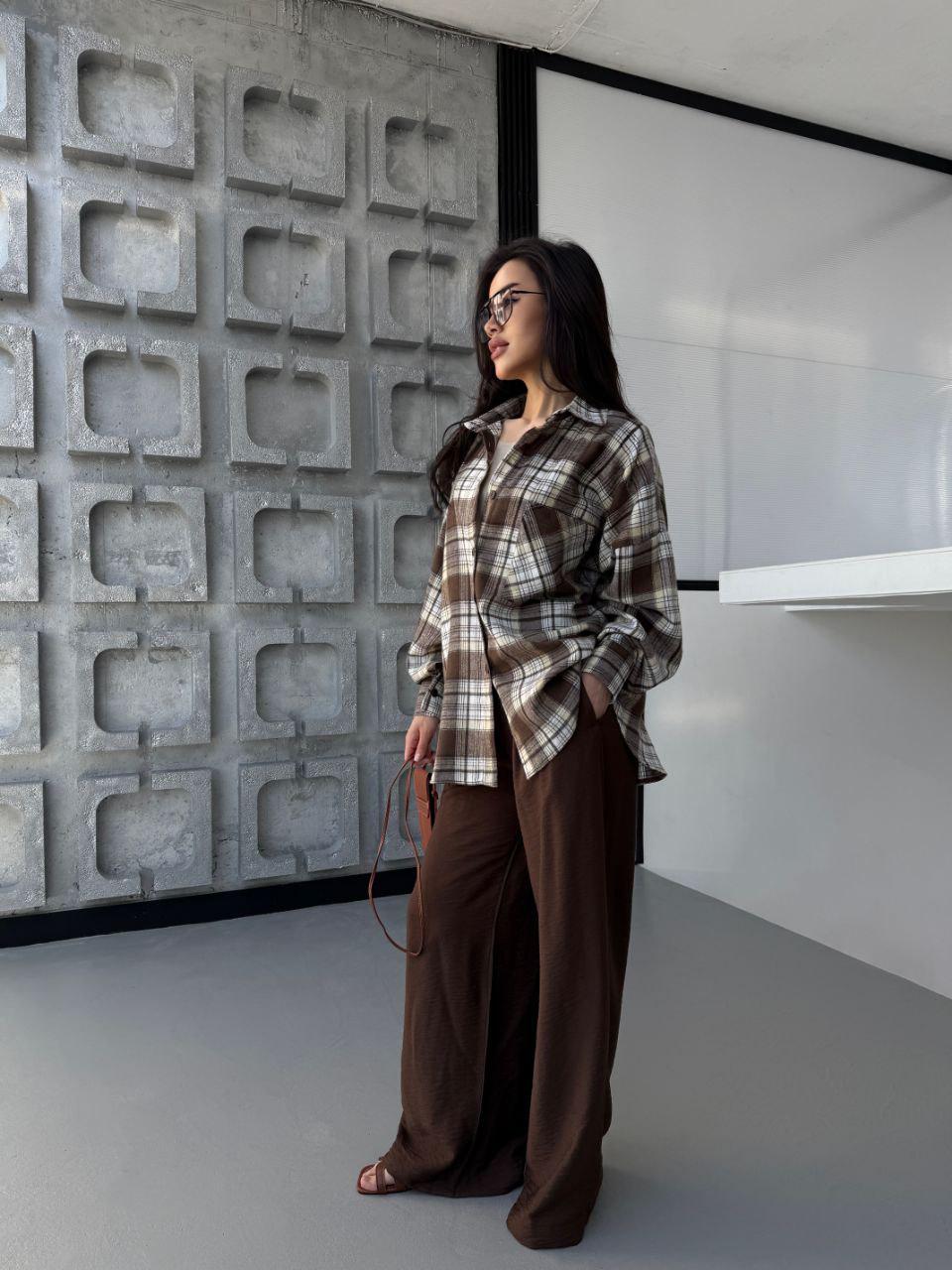 plaid shirt with dress pants 10 navy pants, brown shoes and a red plaid shirt