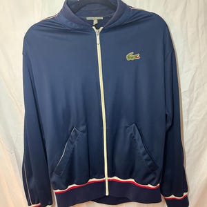 Jaqueta Lacoste vintage, unissex, tamanho P. Ótimo estado.