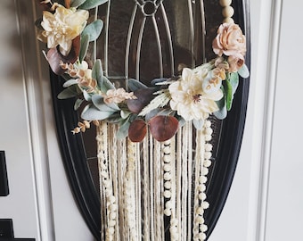 Macrame beaded wreath with flowers