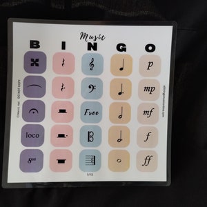 May include: A printable music bingo card with the word "Music" at the top and the letters "BINGO" below. The card has 25 squares with musical symbols and terms, including a treble clef, a flat sign, a sharp sign, a quarter note, a half note, a whole note, a dotted quarter note, a dotted half note, a dotted whole note, a fermata, a crescendo, a diminuendo, a repeat sign, a coda sign, a tempo marking, a dynamic marking, a key signature, a time signature, a bar line, a rest, a tie, a slur, a grace note, a pickup note, and a free space.