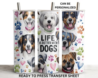 Könnte beinhalten: Ein Sublimationsdesign für einen Edelstahlbecher mit weißem Hintergrund, bunten Pfotenabdrücken, Herzen und Aquarell-Illustrationen von Hunden. Der Text "Life is better with dogs" ist in Schwarz gedruckt. Das Design kann personalisiert werden.