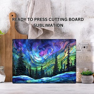 May include: Rectangular cutting board with a colorful stained-glass design depicting a forest scene under a swirling aurora borealis. The board features shades of blue, green, purple, and yellow. Text on the image reads: READY TO PRESS CUTTING BOARD SUBMLIMATION.