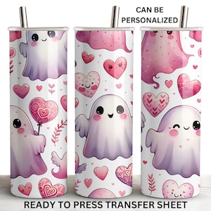 May include: Three white tumblers with a pink and purple ghost and heart design. The tumblers have a stainless steel straw and the text "CAN BE PERSONALIZED" and "READY TO PRESS TRANSFER SHEET".