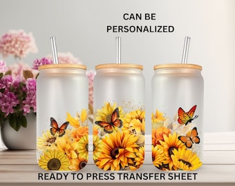 May include: Three sublimation blank tumblers with a design of sunflowers and butterflies. The tumblers are ready to press with a heat press.  The text "CAN BE PERSONALIZED" and "READY TO PRESS TRANSFER SHEET" is visible in the image.