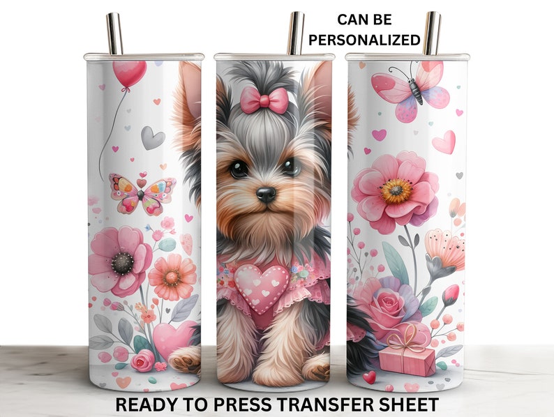 Puede incluir: Un dise&ntilde;o de sublimaci&oacute;n con un lindo cachorro Yorkshire Terrier con flores rosas, mariposas y corazones sobre un fondo blanco. El dise&ntilde;o est&aacute; listo para ser estampado en un vaso de 20 oz.