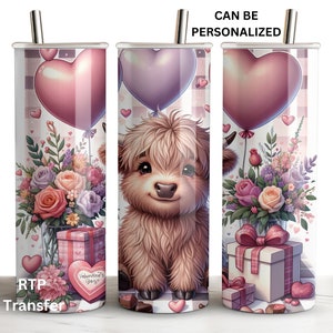 May include: A stainless steel tumbler with a Valentine's Day theme. The tumbler features a Highland cow with pink hearts, flowers, and a gift box. The text "Valentine's Day" is printed on the gift box. The tumbler can be personalized.