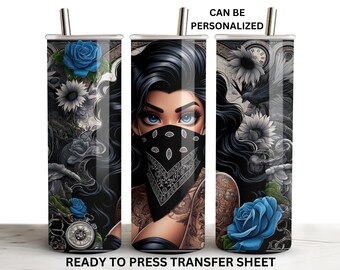 May include: A ready to press sublimation transfer sheet featuring a woman with black hair and blue eyes wearing a bandana. The design includes a blue rose, sunflowers, and a clock. The text "CAN BE PERSONALIZED" is at the top of the image.