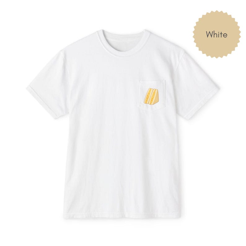 Tamago sando pocket t shirt in white with egg sandwich print on chest pocket