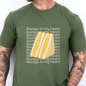 Military green Gildan 64000 t-shirt modeled on male figure, featuring bold tamago sando print with Japanese text on chest