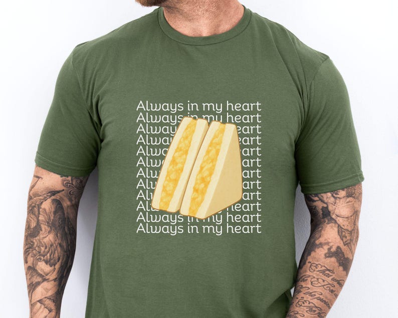 Military green Gildan 64000 t-shirt modeled on male figure, featuring bold tamago sando print with Japanese text on chest