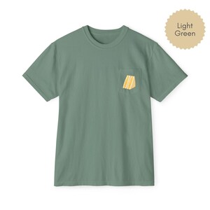 Tamago sando pocket t shirt in light green with egg sandwich print on chest pocket