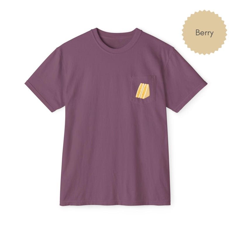 Tamago sando pocket t shirt in berry with egg sandwich print on chest pocket