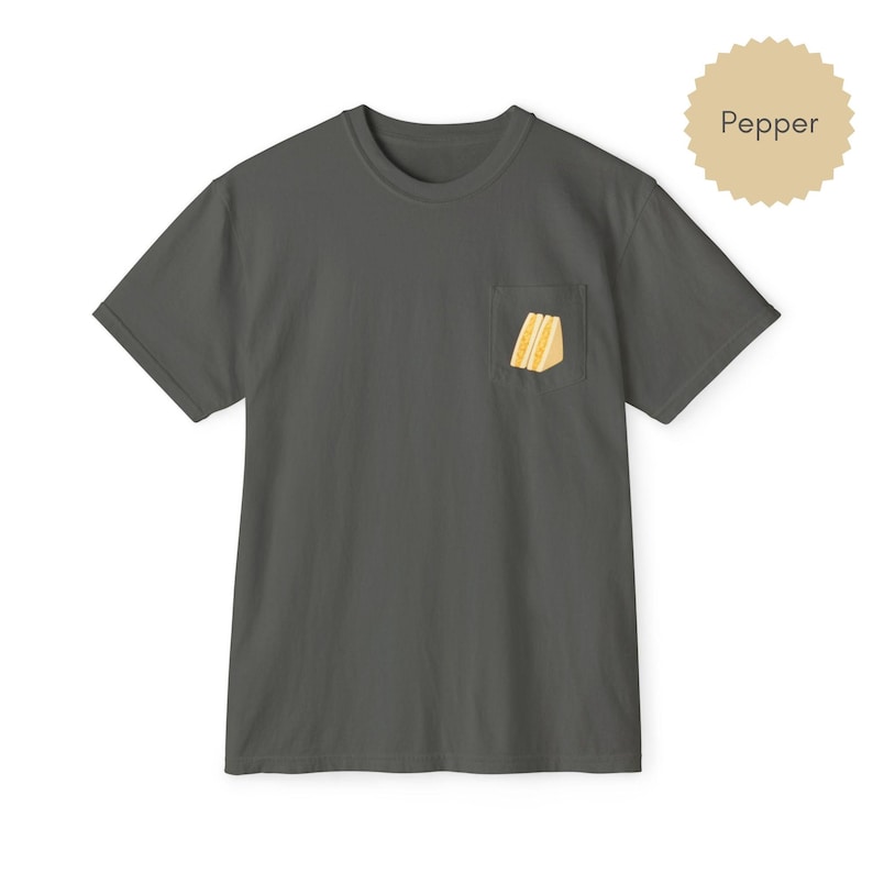Tamago sando pocket t shirt in Pepper with egg sandwich print on chest pocket