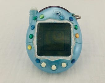 SKU B833P9957 |バンダイジャパン たまごっちV4 ブルーコネクション