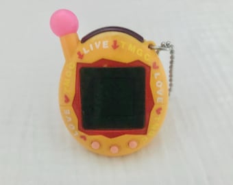 Tamagotchi Connection Entama (Japanese V4): Moji Moji Orange