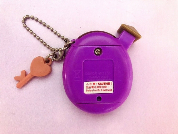 Tamagotchi Connection V5.5 Familitchi: Purple With Tamagotchi Connection V5.5 Familitchi: Purple With