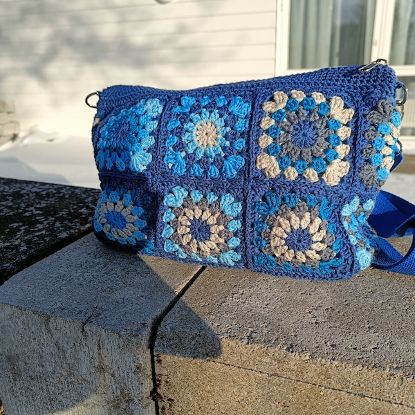 Blue granny square handmade chic crochet clutch and crossoverbag. 2 in one bag. All day toiletry pouch and cosmetic bag