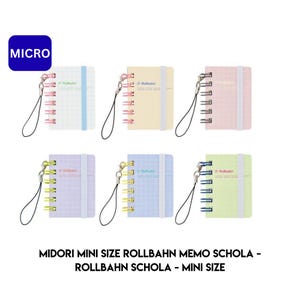 May include: Six mini Rollbahn memo notebooks in pastel colors: white with blue grid, yellow, pink, lavender, blue with white grid, and green. Each notebook has a spiral binding, elastic band, and a lanyard. The word "MICRO" is in a blue box.