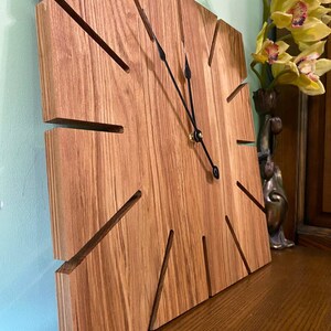 Large wall clock made of natural wood
