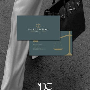 May include: Two business cards with a teal background. The top card has the name "Mark M. William" and the word "lawyer" below it. A gold scale of justice icon is above the name. The bottom card has a gold scale of justice icon.