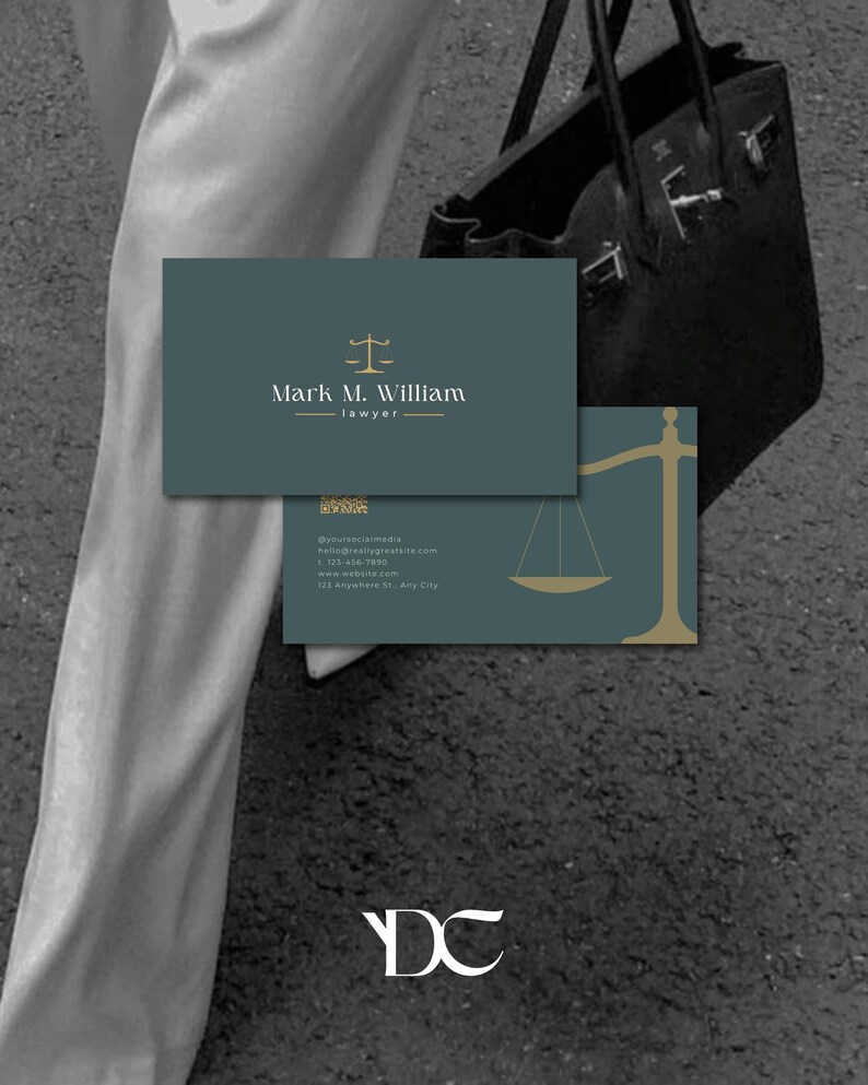 May include: Two business cards with a teal background. The top card has the name "Mark M. William" and the word "lawyer" below it. A gold scale of justice icon is above the name. The bottom card has a gold scale of justice icon.