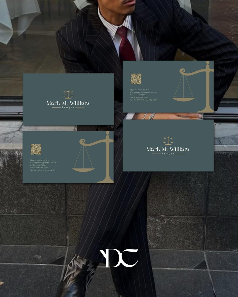 May include: Four business cards with a teal background and gold accents. The cards feature a scale of justice graphic and the name "Mark M. William, lawyer." A QR code and contact information are also included. The cards are displayed in front of a person wearing a pinstripe suit.