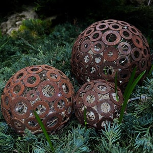 Cosmic Harmony Spheres — a trio of meticulously handcrafted rusty metal orbs, Metal sphere for Outdoor decor