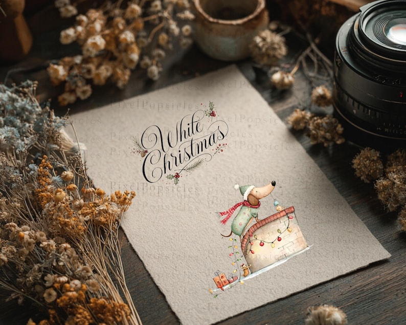 May include: A textured off-white paper sheet featuring the black cursive text White Christmas and a watercolor illustration of a dachshund wearing a green hat and red scarf, perched on a chimney decorated with colorful string lights and gifts.