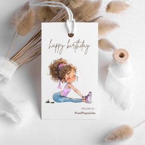 May include: A white card with the text "happy birthday" in brown lettering. A cartoon illustration of a woman with brown hair wearing a pink shirt and blue trousers is stretching. The text "FOLLOW US: PixelPopsicles" is at the bottom of the card.