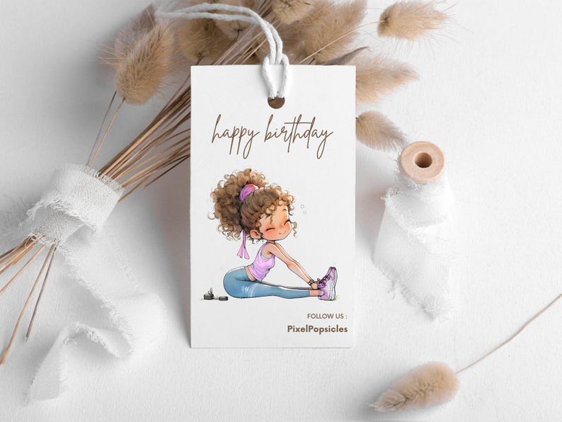 May include: A white card with the text "happy birthday" in brown lettering. A cartoon illustration of a woman with brown hair wearing a pink shirt and blue trousers is stretching. The text "FOLLOW US: PixelPopsicles" is at the bottom of the card.