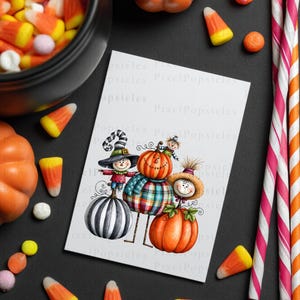 May include: A rectangular card featuring a whimsical illustration of three pumpkins with faces, wearing hats and scarves, surrounded by candy corn, a black bowl, and striped paper straws. The card has the text PixelPopsicles printed on it.