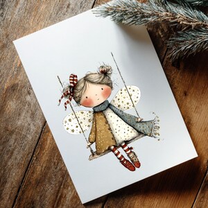 May include: A whimsical illustration of a fairy on a swing. The fairy has brown hair, rosy cheeks, and is wearing a brown and white dress, a blue scarf, and red and white striped socks. The fairy's wings are white with gold stars.