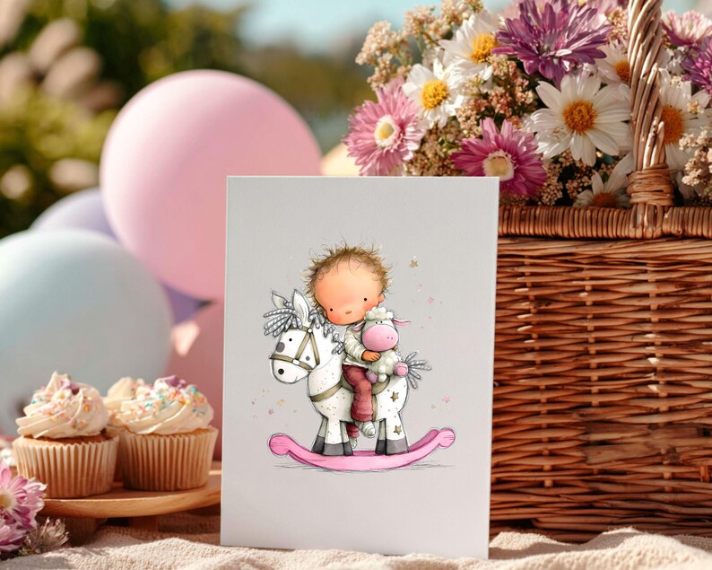 May include: A greeting card featuring a whimsical illustration of a child riding a rocking horse, accompanied by a stuffed animal. The card has a light gray background, with a pink rocking horse and a child wearing red pants. A basket of flowers and cupcakes are in the background.