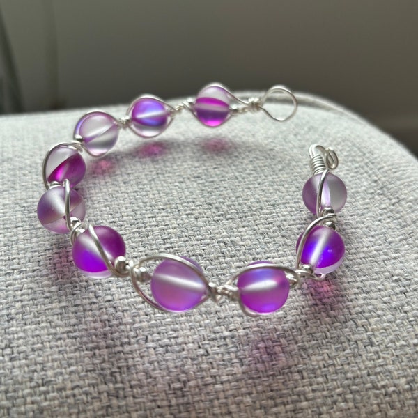 Twisted Bracelet with Light-Catching Beads in Purple