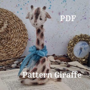 May include: A PDF pattern for a giraffe plush toy. The pattern includes instructions for sewing a giraffe with a white and brown spotted body, a long neck, and a blue ribbon around its neck.