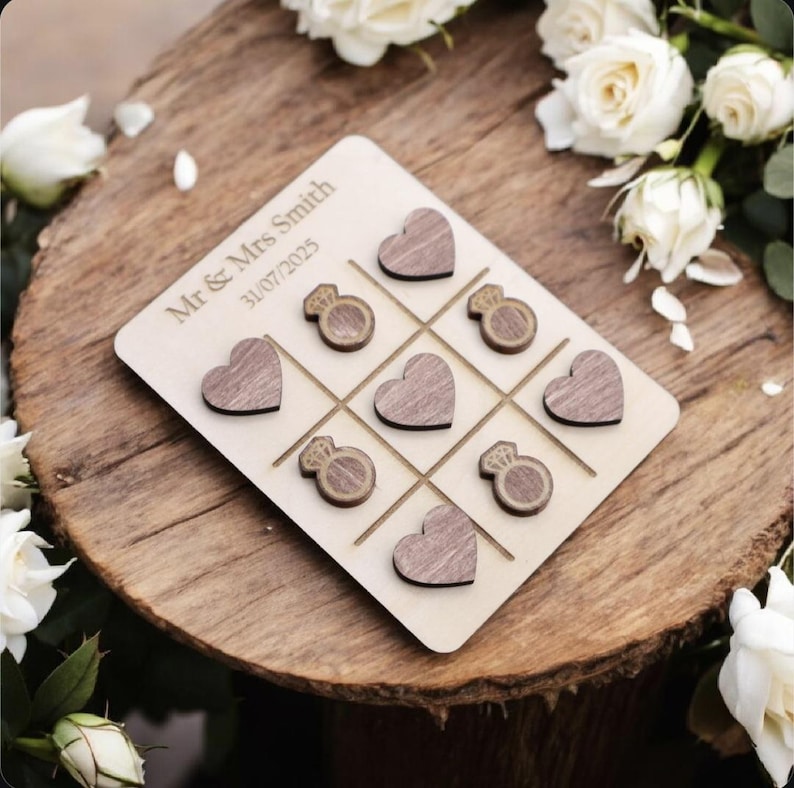 Wooden Tic Tac Toe game, handcrafted and eco-friendly, perfect for family game nights, coffee table decor, or unique gifts for kids and adults. Stylish and durable design made from high-quality wood, ideal for birthdays, parties, or educational activities. A personalised Tic Tac Toe set makes a great keepsake or custom decor piece. Fun and interactive wooden game for children and families, blending entertainment with style in any home or event