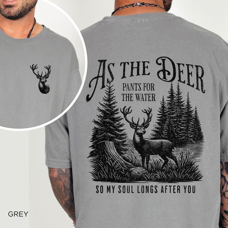 May include: Grey t-shirt with a deer graphic on the front and the text "As the Deer Pants for the Water So My Soul Longs After You" on the back.
