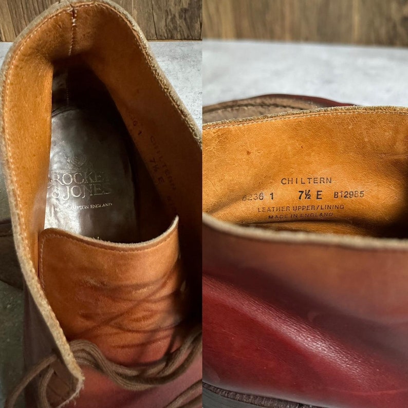 May include: Close-up of the interior of a brown leather shoe with the brand name "Rocker & Jones" and the size "7 1/2 E" printed on the insole. The shoe is made in England.