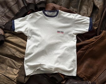 Camiseta Ringer vintage de Champion 'New York', EE. UU., años 70, talla L