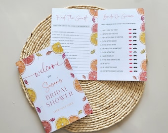 May include: Two printable bridal shower game cards with a citrus theme. The first card has the title "Find the Guest" and lists questions to ask guests about the bride and groom. The second card has the title "Bride or Groom" and lists questions about the couple to determine who does what better. Both cards feature a watercolor illustration of orange slices and pink flowers.