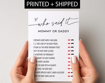 May include: A printable game card with the text "Who Said It? Mommy or Daddy" and a list of statements about pregnancy and parenthood. Each statement is followed by a row of red lips and black mustaches for players to guess who said it.