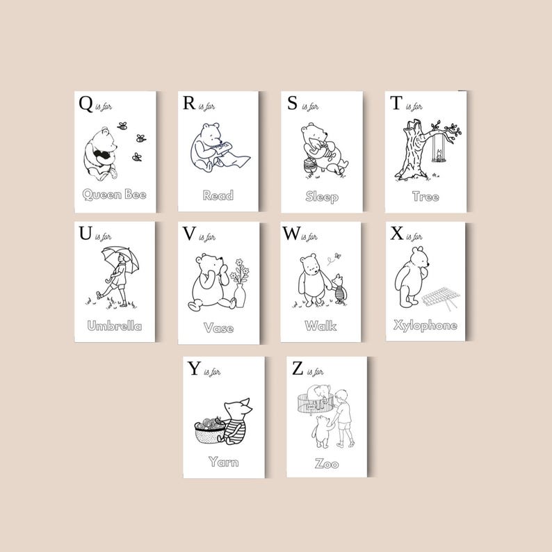 May include: Nine black and white illustrated cards featuring Winnie the Pooh characters and objects, each representing a letter of the alphabet from Q to Z. The cards include words like "Queen Bee," "Read," and "Zoo."