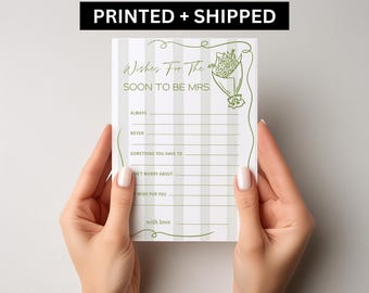 May include: A white card with green striped background and text "Wishes For The Soon To Be Mrs." is held by two hands. The card has lines for writing and a floral illustration. The text "PRINTED + SHIPPED" is at the top.