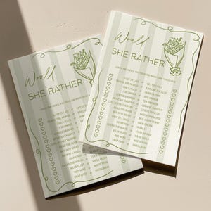 May include: Two light green "Would She Rather" game cards with a floral illustration and text. The cards have a striped background and a decorative border of hearts. The text includes various choices.